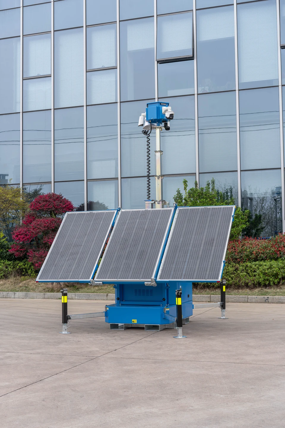 Blue solar surveillance equipment with camera mast and solar panels